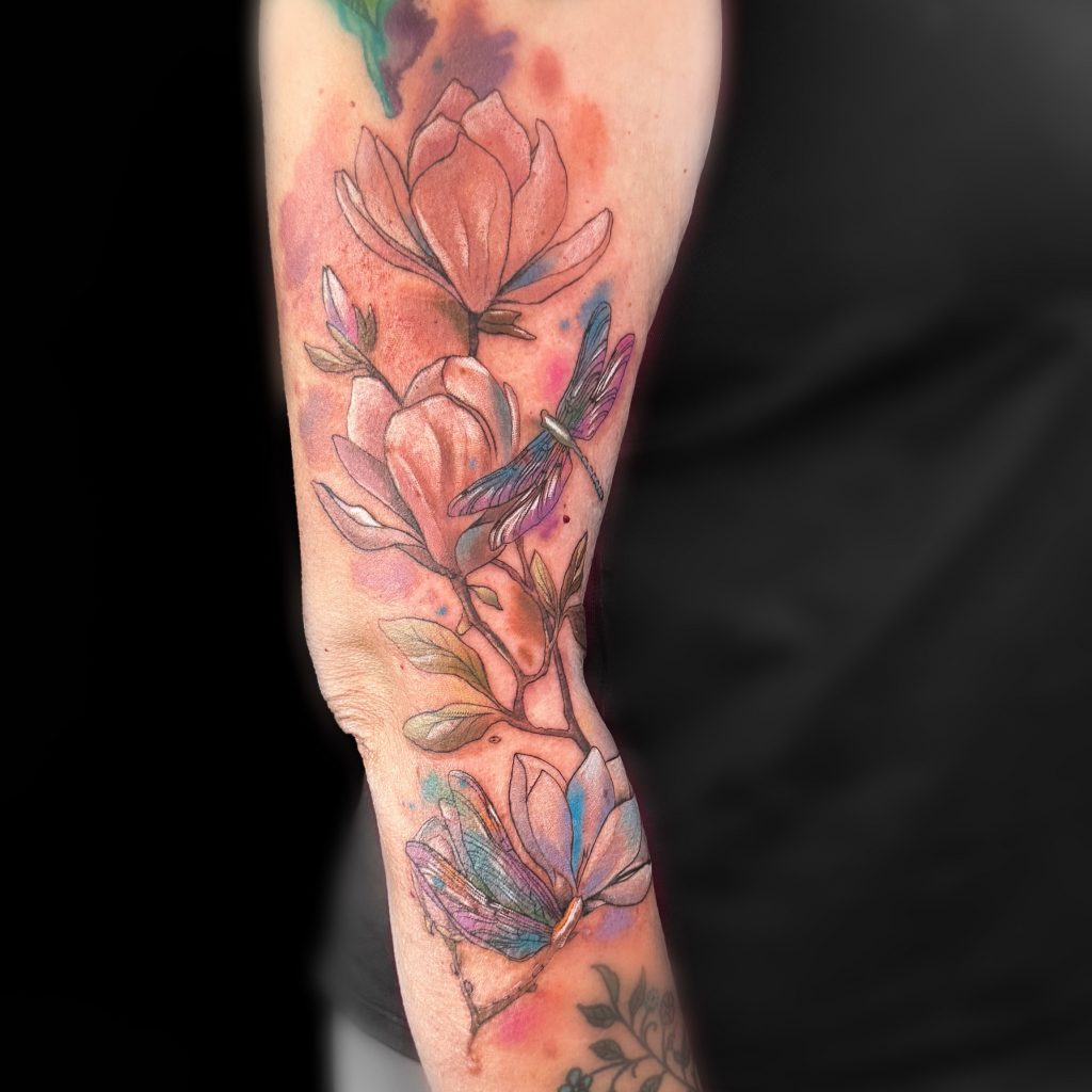 Ksu Storm colourful magnolia tattoo