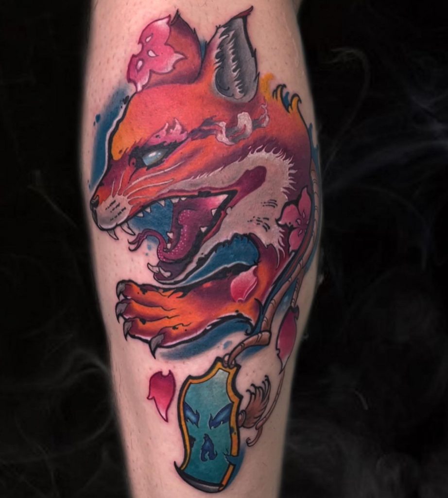 Red fox with snake tongue tattoo